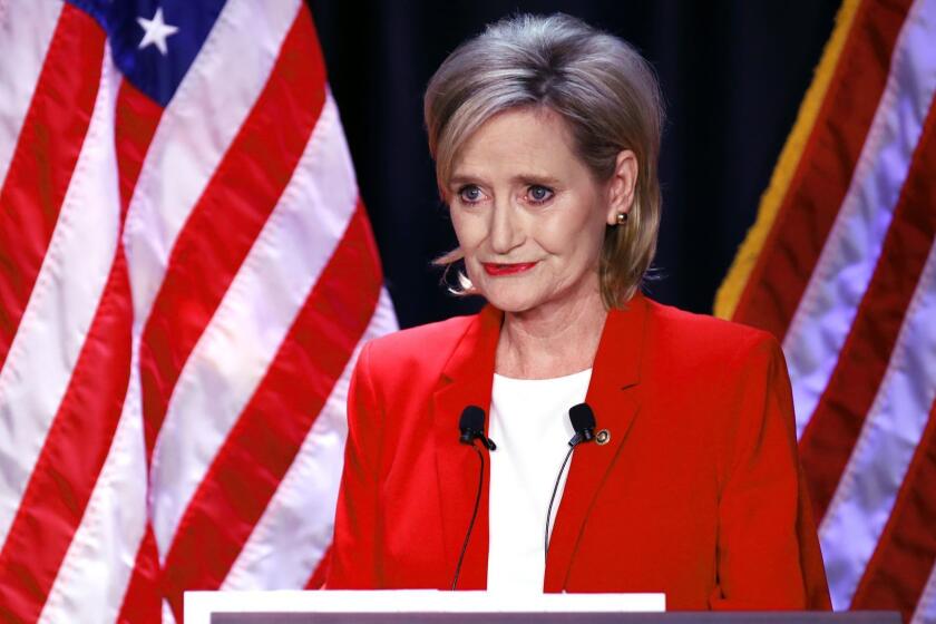 Appointed U.S. Sen. Cindy Hyde-Smith, R-Miss., answers a question during a televised Mississippi U.S. Senate debate with Democrat Mike Espy in Jackson, Miss., Tuesday, Nov. 20, 2018. (AP Photo/Rogelio V. Solis, Pool)