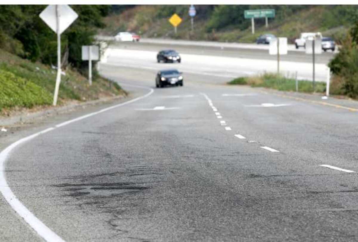 The Foothill (210) Freeway on-ramps and off-ramps through La Canada Flintridge will soon be fixed, like this one on the westbound 210 freeway at Gould Avenue showing pot holes.
