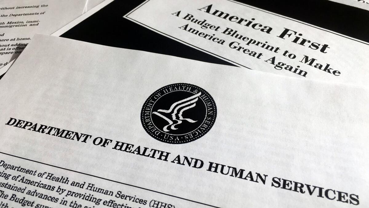 A portion of President Donald Trump's first proposed budget, focusing on the Department of Health and Human Services, and released by the Office of Management and Budget, is photographed in Washington, Wednesday, March 15, 2017.