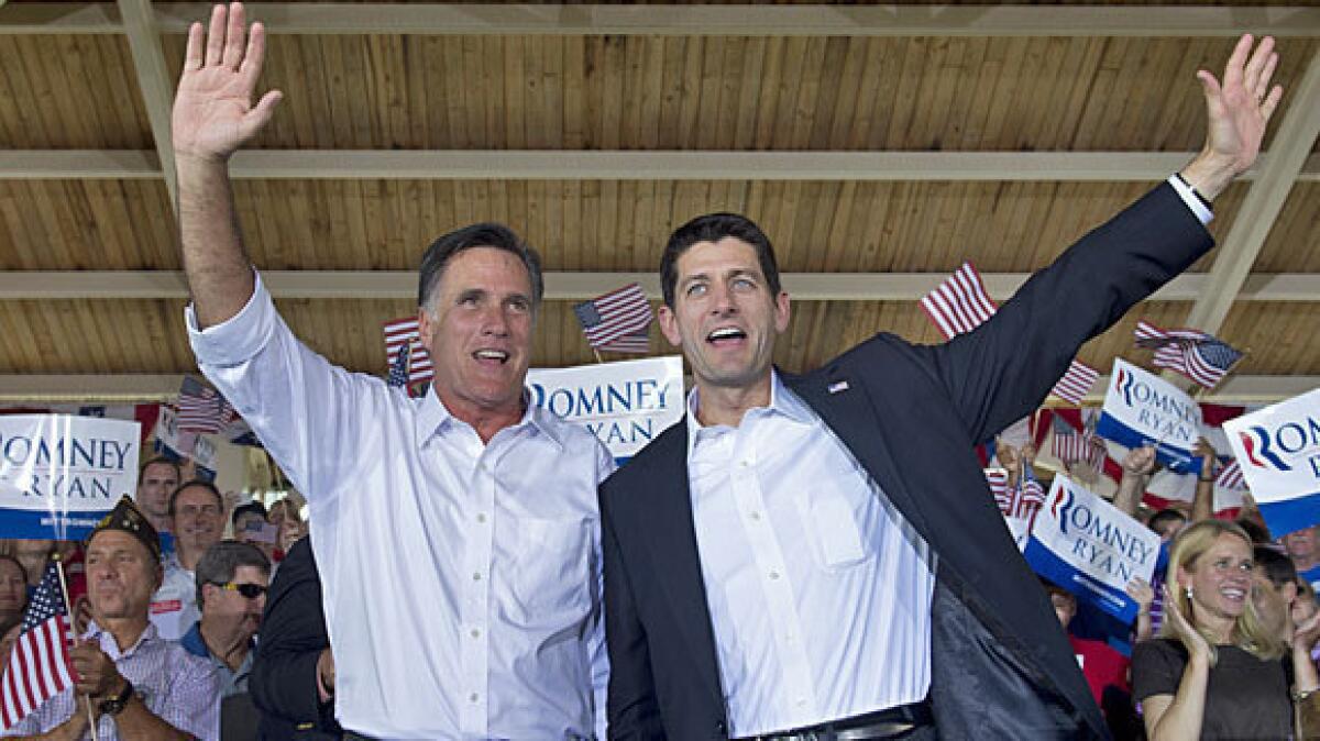 Republican presidential candidate Mitt Romney, left, and his running mate, Rep. Paul Ryan, at a rally in Manassas, Va.
