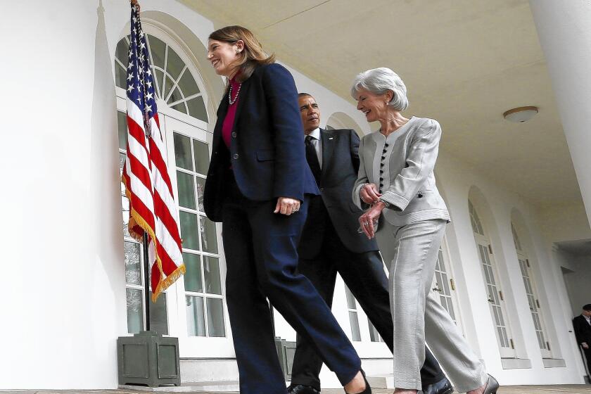 President Obama leaves the White House Rose Garden with outgoing Health and Human Services Secretary Kathleen Sebelius, right, and his nominee to replace her, budget director Sylvia Mathews Burwell.