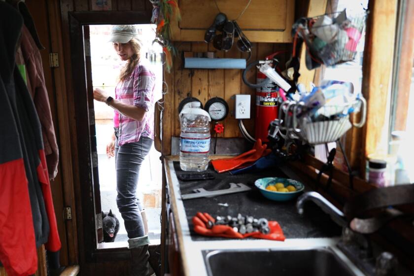 FT. BRAGG-CA-JULY 24, 2018: Heather Sears is photographed on her fishing boat in Ft. Bragg. Sears, who operated a fishing boat for years has seen her business dwindle as water is diverted to agriculture from rivers where salmon spawn. (Christina House / Los Angeles Times)