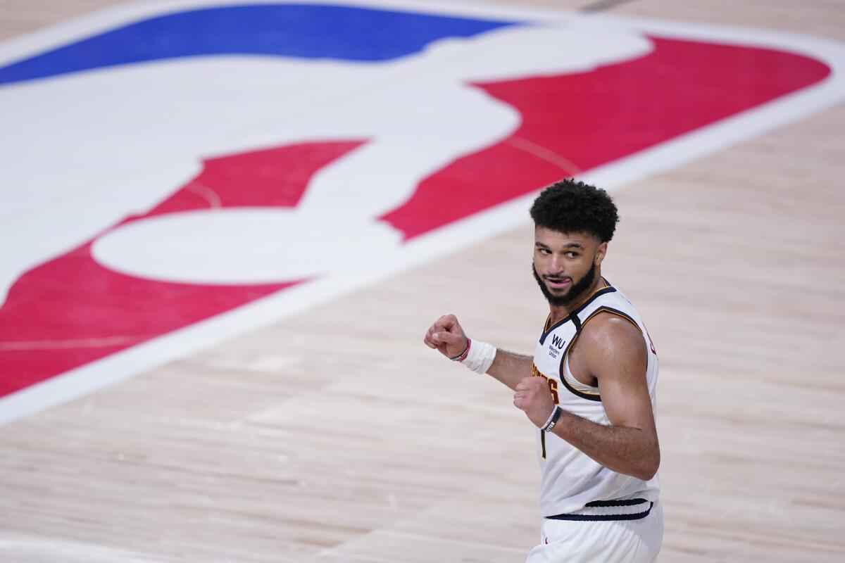 Jamal Murray celebrates the Nuggets' Game 7 win over the Clippers on Sept. 15, 2020.