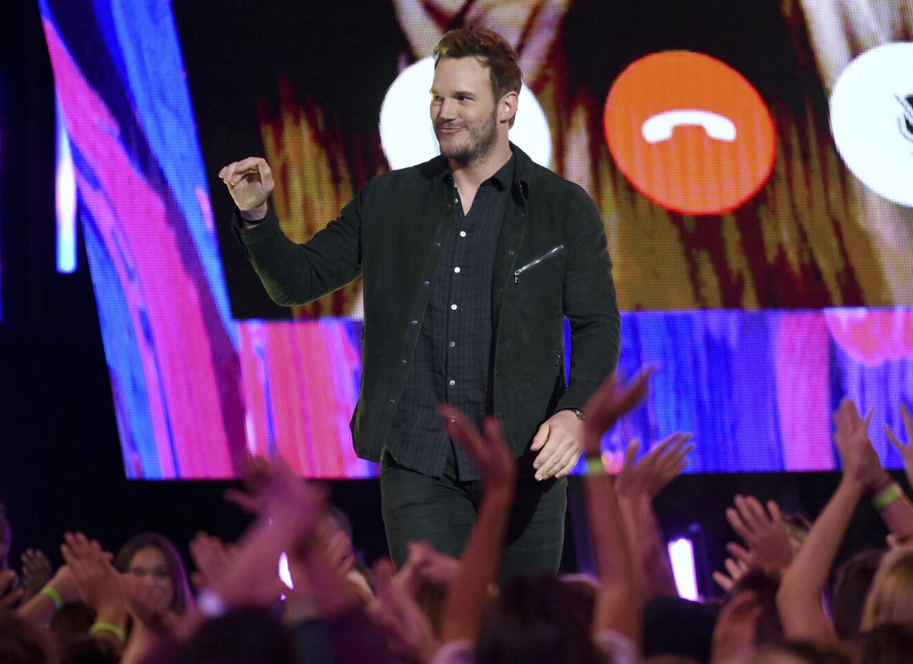 Chris Pratt greets the audience Sunday as he accepts the award for choice sci-fi movie actor for "Guardians of the Galaxy Vol. 2" at the Teen Choice Awards on Sunday at the Galen Center in Los Angeles.