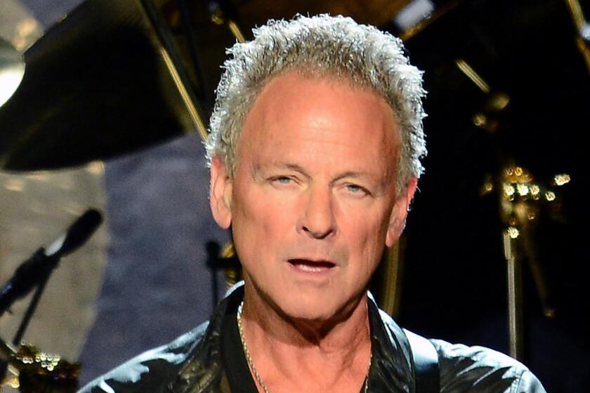 Lindsey Buckingham of Fleetwood Mac perform at the MGM Grand Garden Arena on May 26, 2013 in Las Vegas.