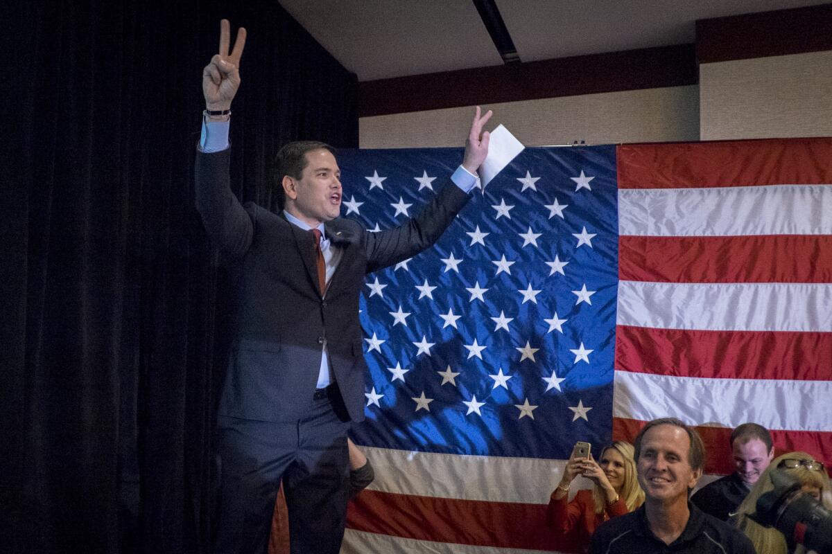 Republican presidential candidate Marco Rubio acknowledges the crowd after addressing supporters at a caucus night party in Des Moines, Iowa on Feb. 1.