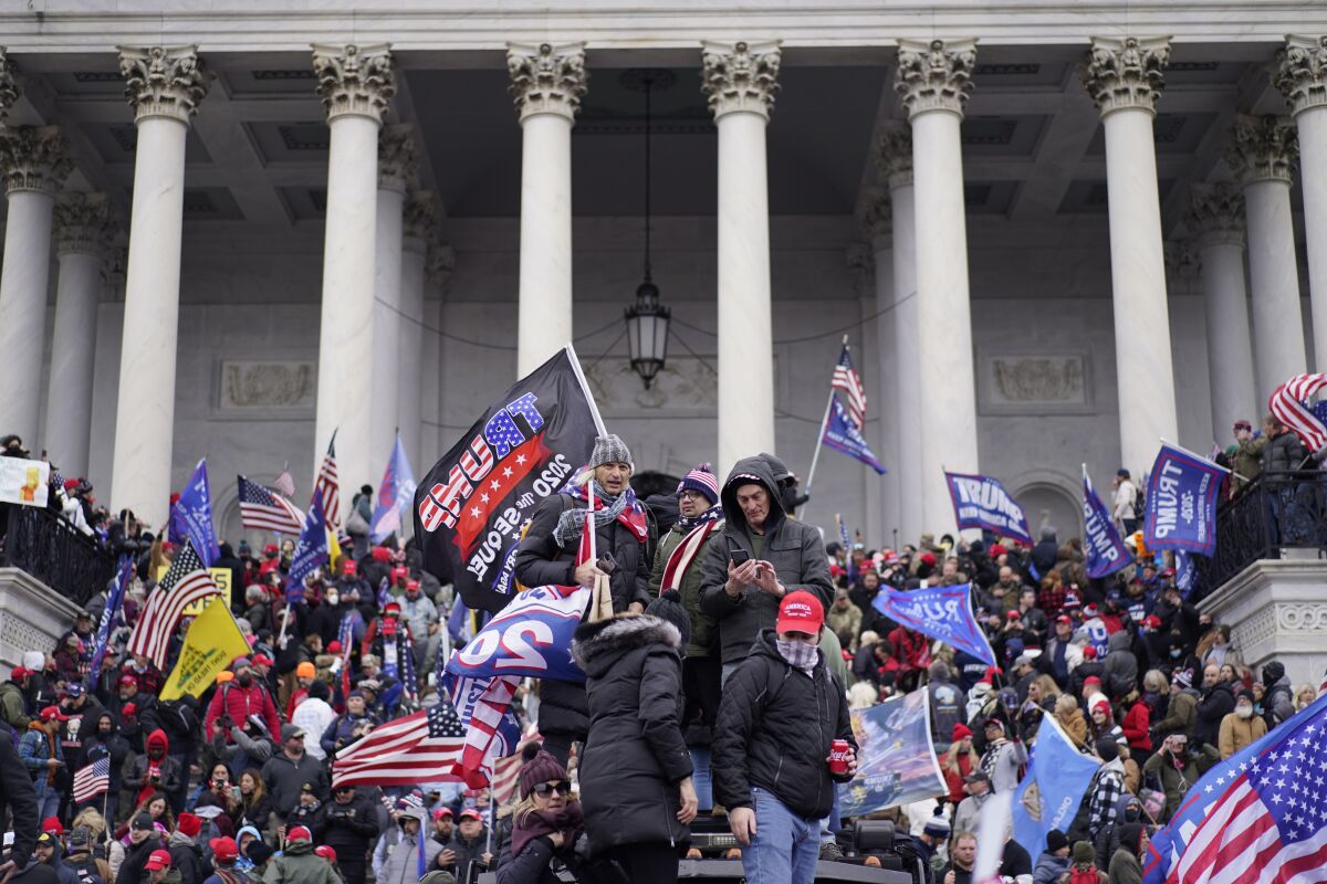 Capitol police try to hold back rioters on Jan. 6.
