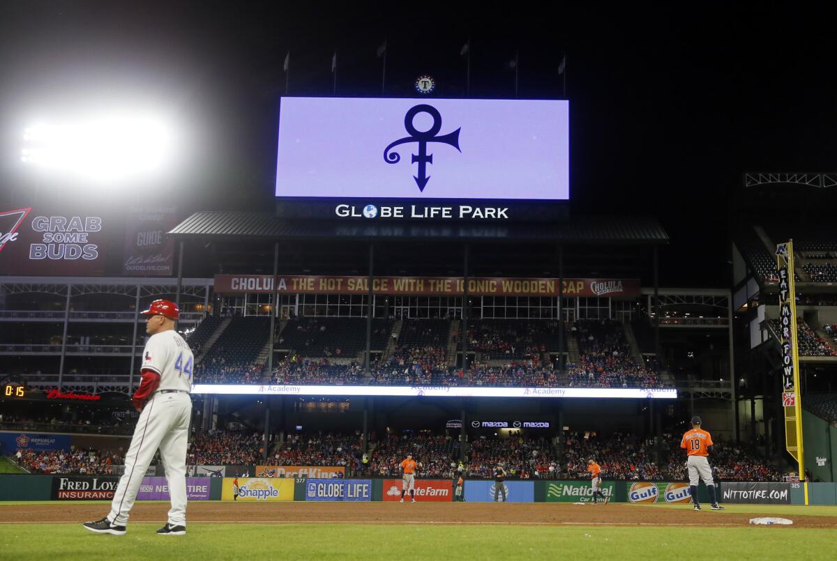 Prince's symbol is displayed at the Texas Rangers-Houston Astros game in Arlington.