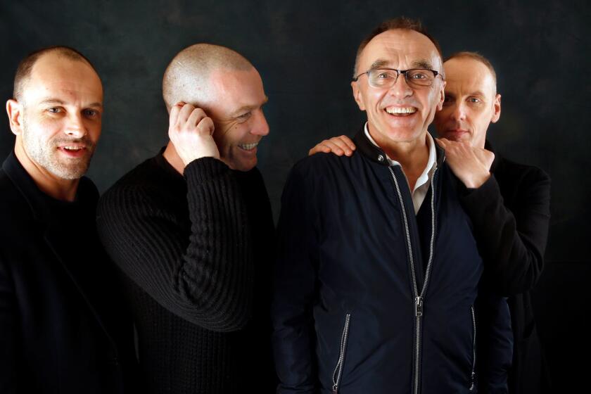 NEW YORK, NEW YORK--MARCH 14, 2017--Director Danny Boyle, third from left, along with Jonny Lee Miller, left, Ewan McGregor, second from left, and Ewen Bremner, right, of Trainspotting as they reunite for a sequel 20 years later. Photographed in New York on March 14, 2017(Carolyn Cole/Los Angeles Times)