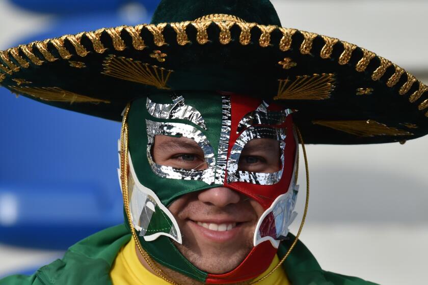 A supporter of Mexico waits for the start of the 2015 Copa America football championship match between Mexico and Ecuador, in Rancagua, Chile, on June 19, 2015. AFP PHOTO / NELSON ALMEIDANELSON ALMEIDA/AFP/Getty Images ** OUTS - ELSENT, FPG - OUTS * NM, PH, VA if sourced by CT, LA or MoD **