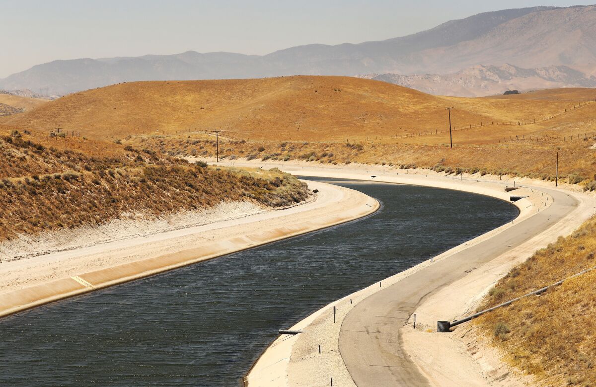 The California Aqueduct branches east and west as it courses through the flat, windy sprawling grasslands on Tejon Ranch.