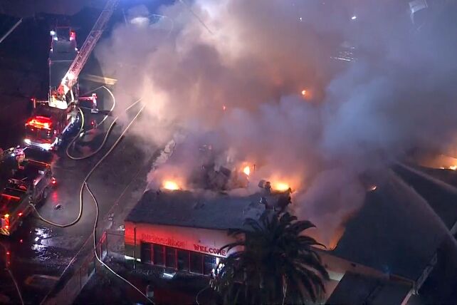 Firefighters battle flames at Compton high school