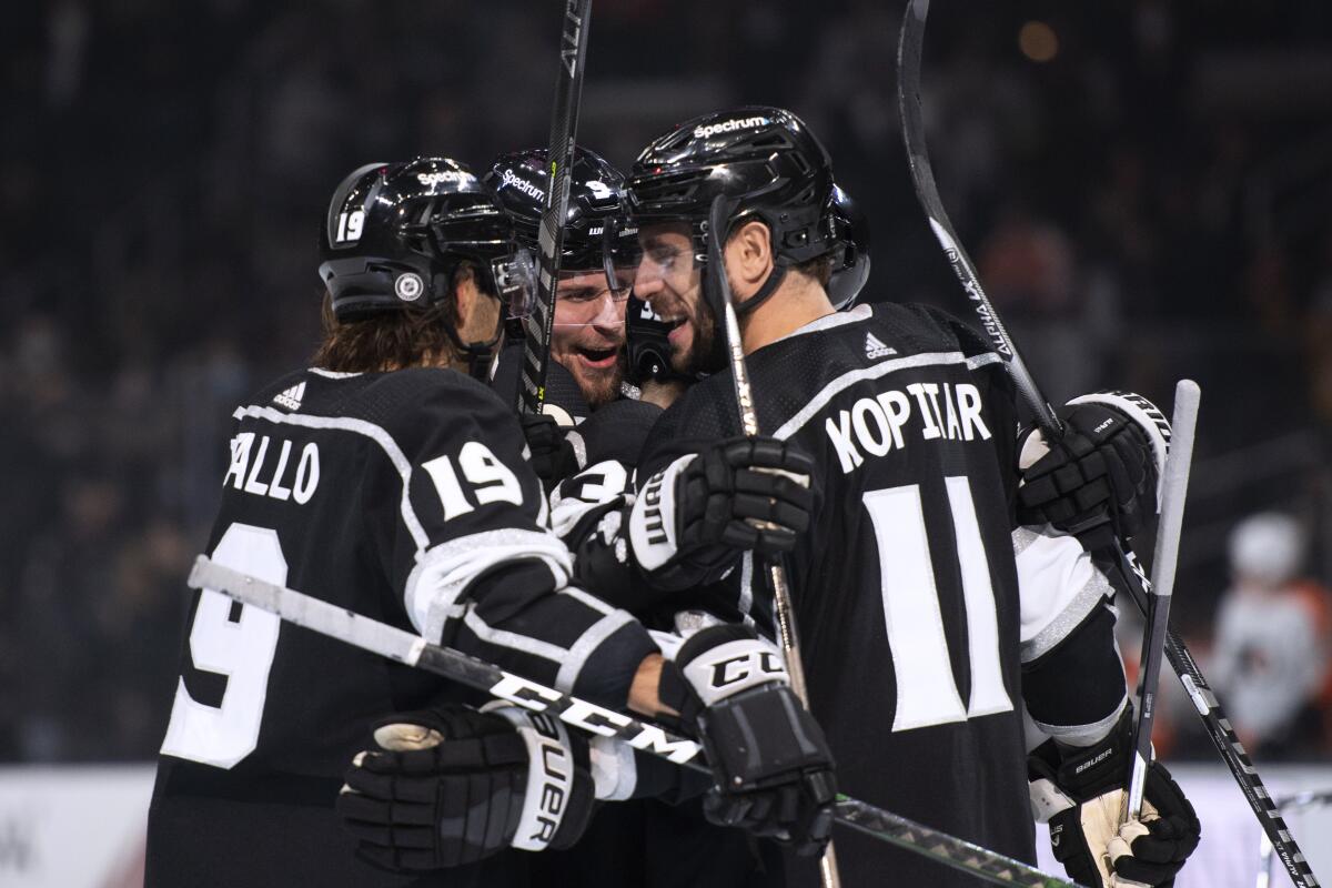 Kings celebrate a goal by center Adrian Kempe during the second period of a 6-3 win over the Philadelphia Flyers.