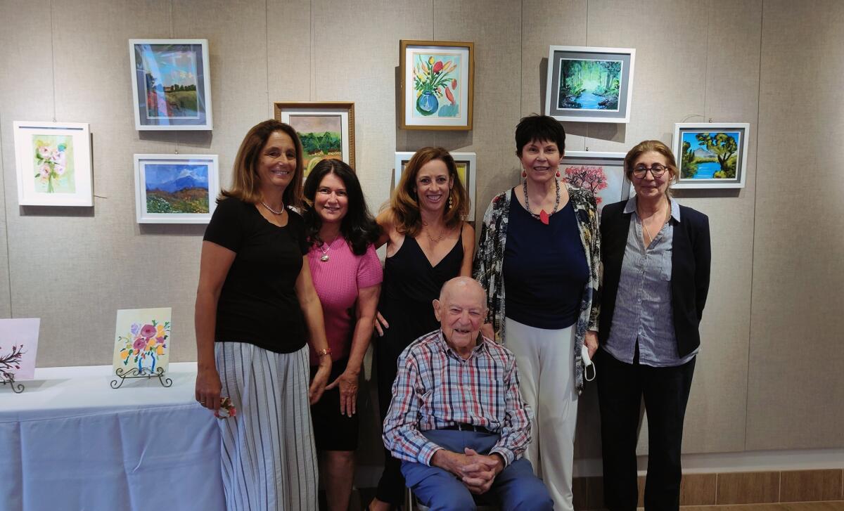 Mimi Guarneri, Anne Michelle Casco, Marjorie Nass, Ruth Yansick and Nicole Caulfield (standing, from left) and Martin Nass 