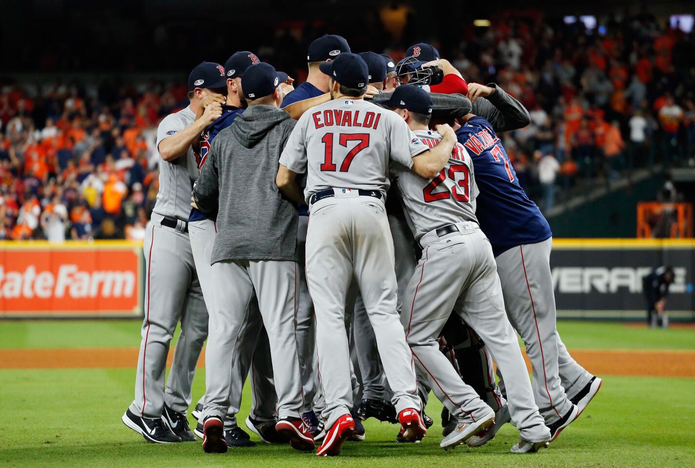 HOUSTON, TX - OCTOBER 18: The Boston Red Sox celebrate defeating the Houston Astros 4-1 in Game Five of the American League Championship Series to advance to the 2018 World Series at Minute Maid Park on October 18, 2018 in Houston, Texas. (Photo by Bob Levey/Getty Images) ** OUTS - ELSENT, FPG, CM - OUTS * NM, PH, VA if sourced by CT, LA or MoD **
