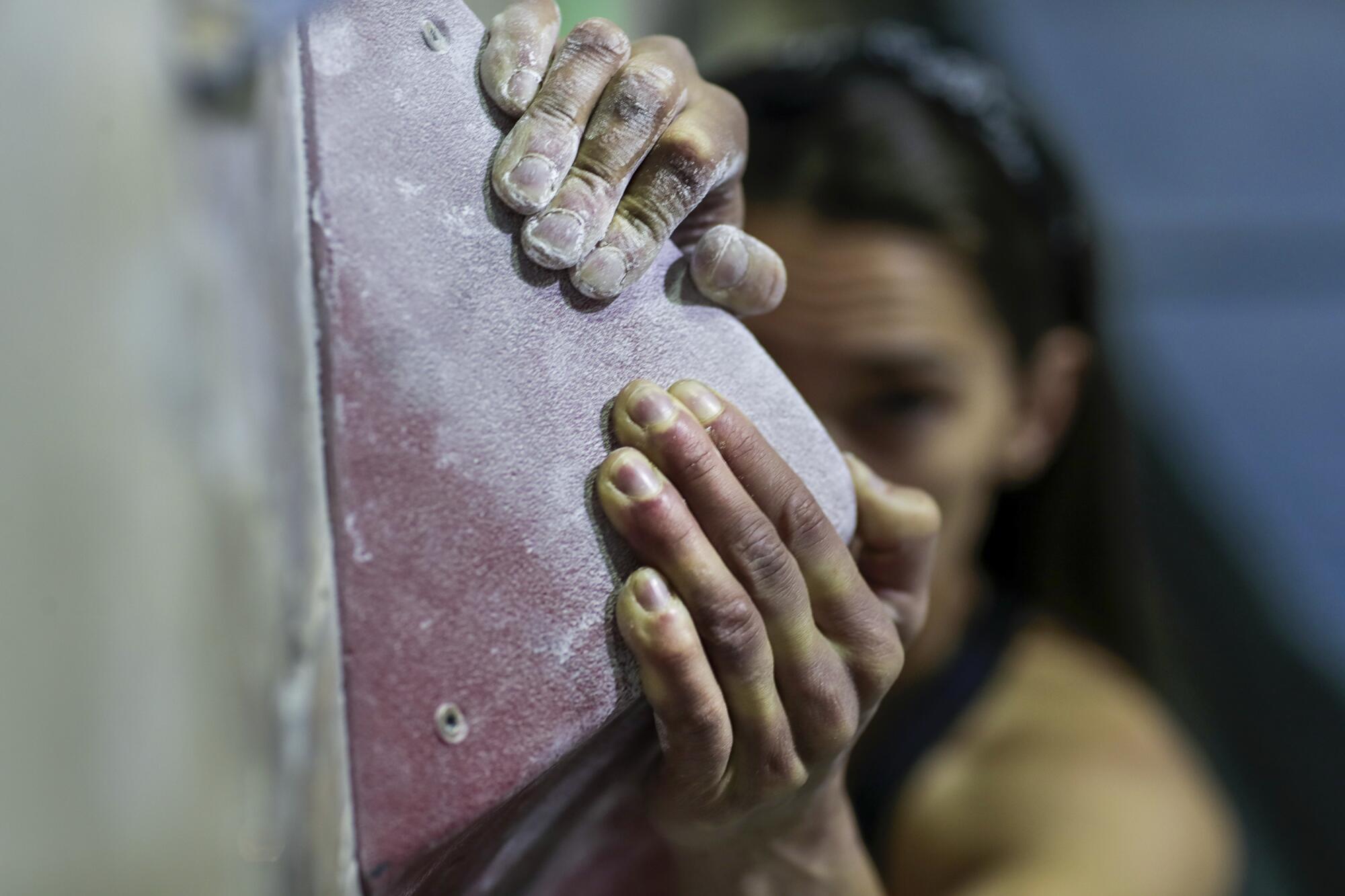 The hands of U.S. sports climbing Olympian Kyra Condie.