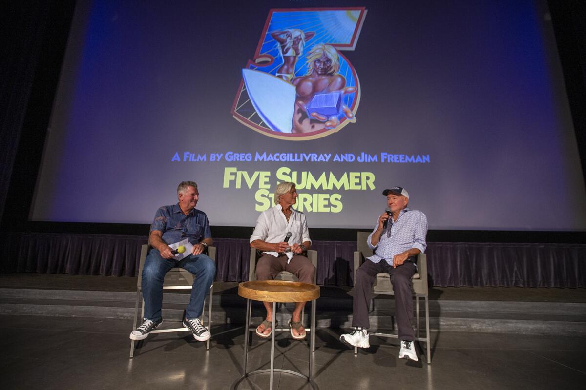 Quiksilver co-founder Bob McKnight, Sam George, and director Greg MacGillivray talk during a Q&A.