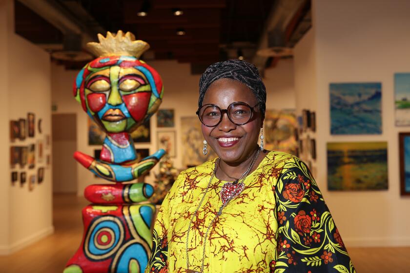 The Huntington Beach Art Center is currently hosting its largest showcase of the year, "Centered on the Center," featuring 200 artists including Adeola Davies-Aiyeloja with her "Mother Earth, She Wears her Golden Crown" shown above.