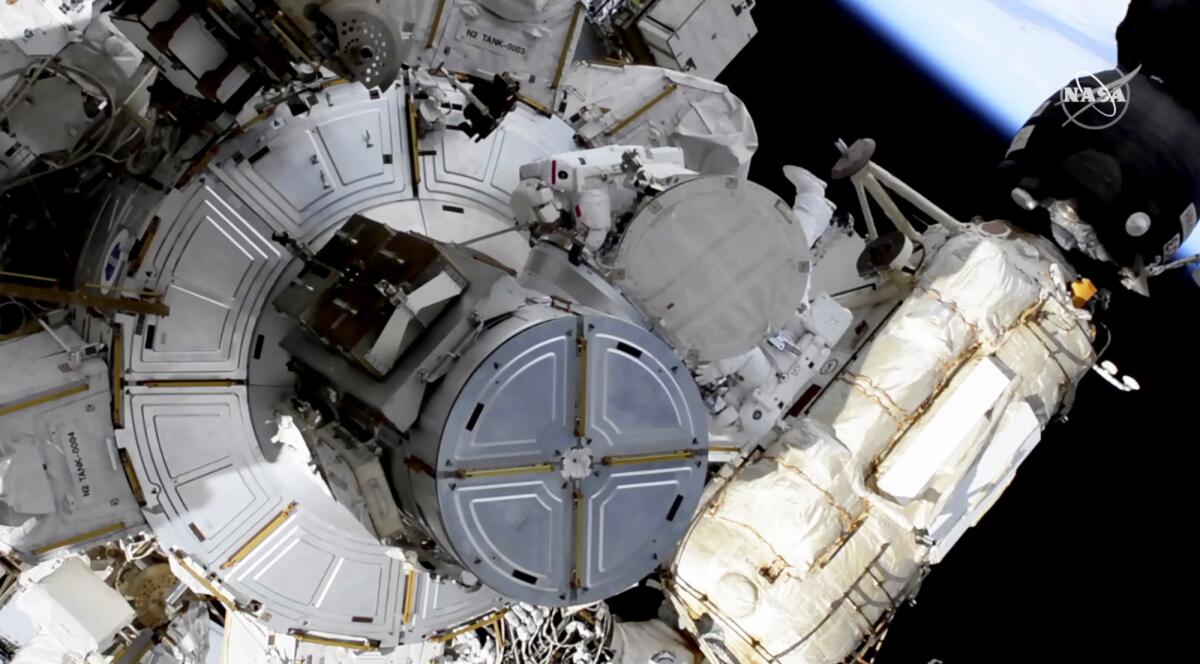 The International Space Station is being outfitted with new, more powerful solar panels. 