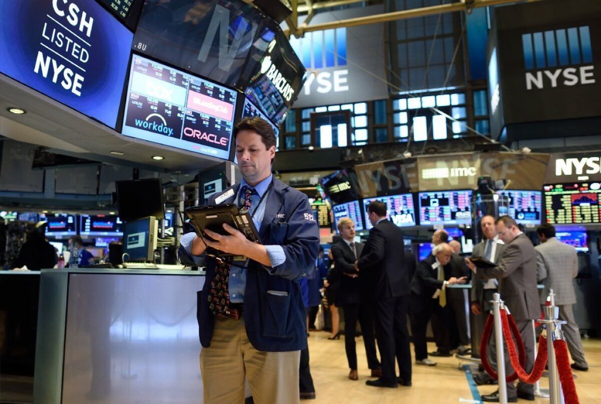 Traders on the floor of the New York Stock Exchange on Aug. 24.