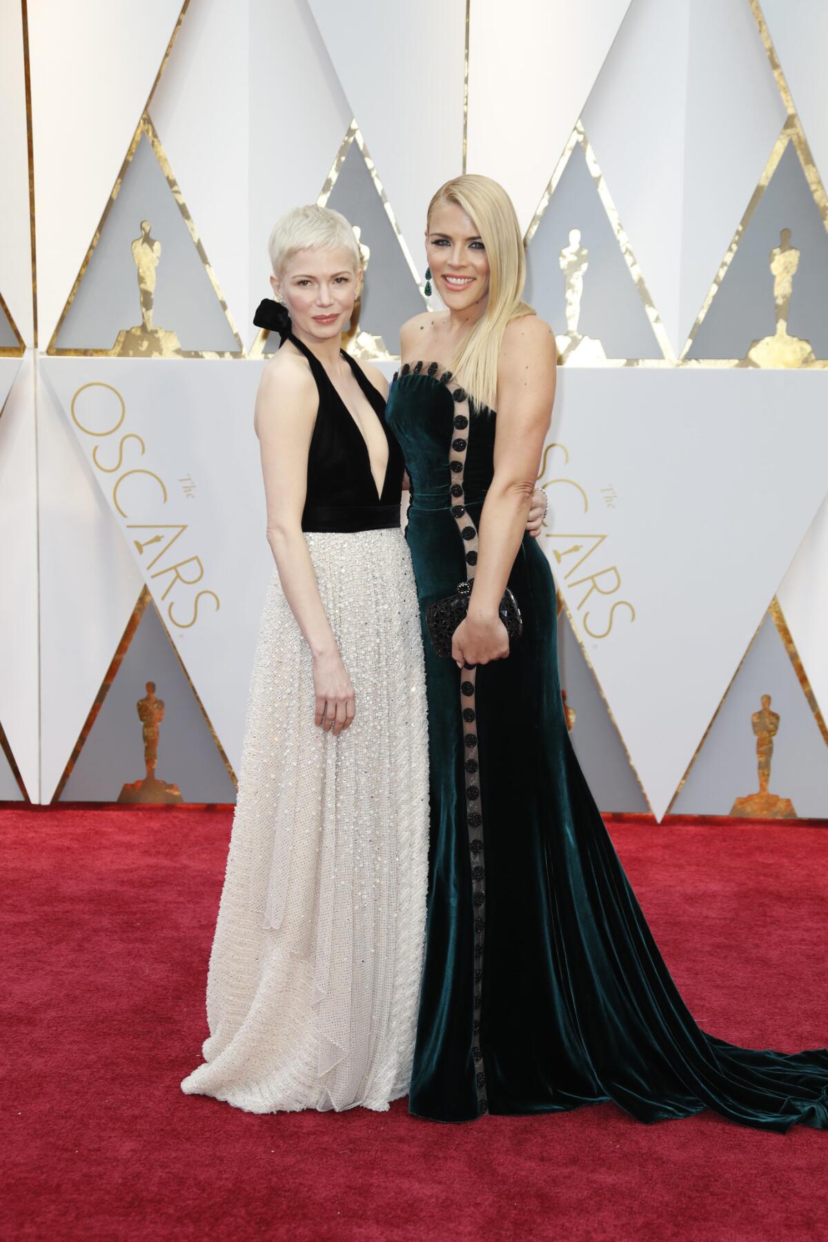 Best friends Michelle Williams, left, and Busy Philipps on the red carpet at the 89th Academy Awards on Feb. 26, 2017, at the Dolby Theatre in Hollywood.