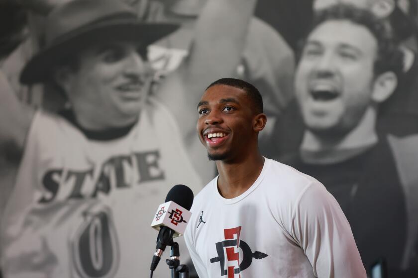 San Diego, CA - March 17: San Diego State's Lamont Butler was all smiles after the Aztecs were selected to as a 5-seed to play in Spokane in the NCAA tournament on Sunday, March 17, 2024 in San Diego, CA. (K.C. Alfred / The San Diego Union-Tribune)