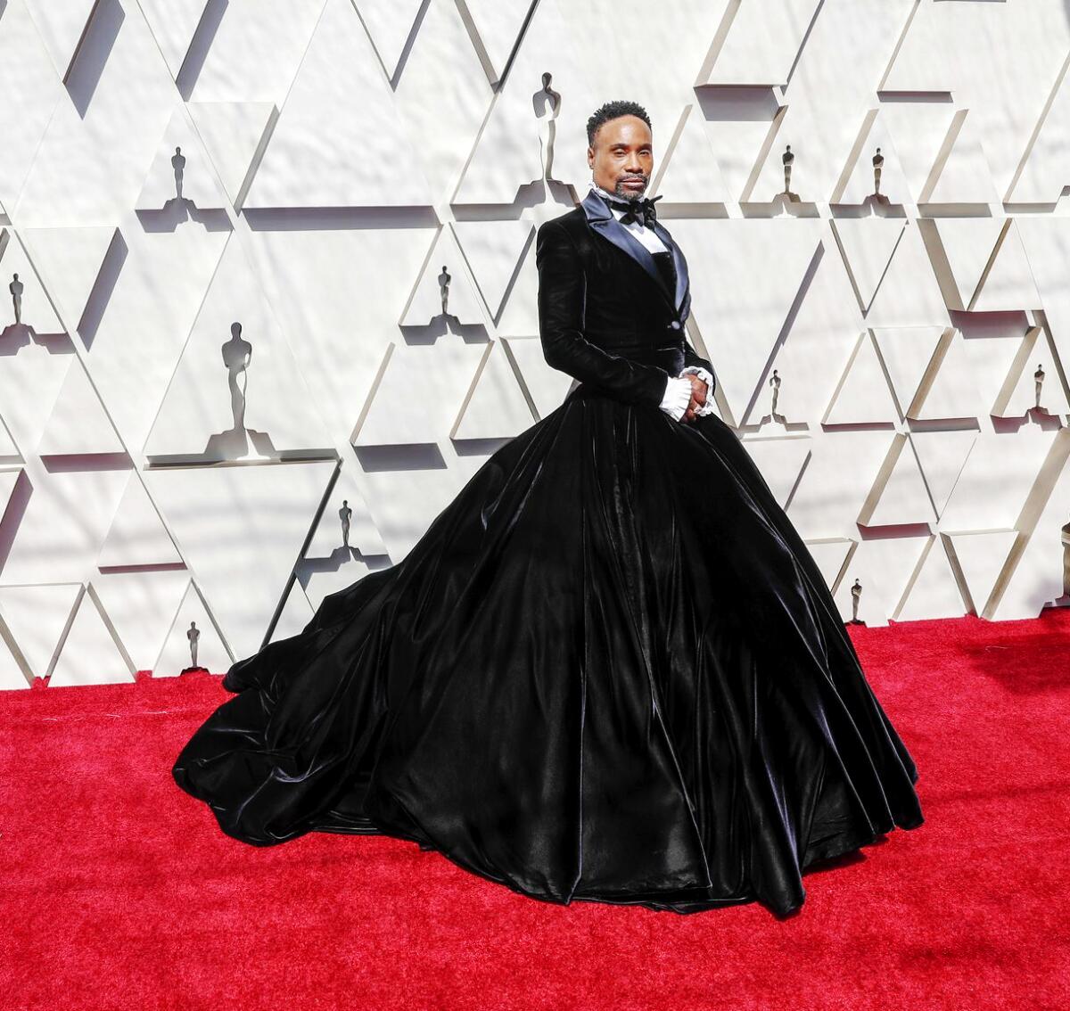 At the 2019 Oscars, Billy Porter wears a custom Christian Siriano creation that deftly melds the most striking elements of men's and women's formalwear.