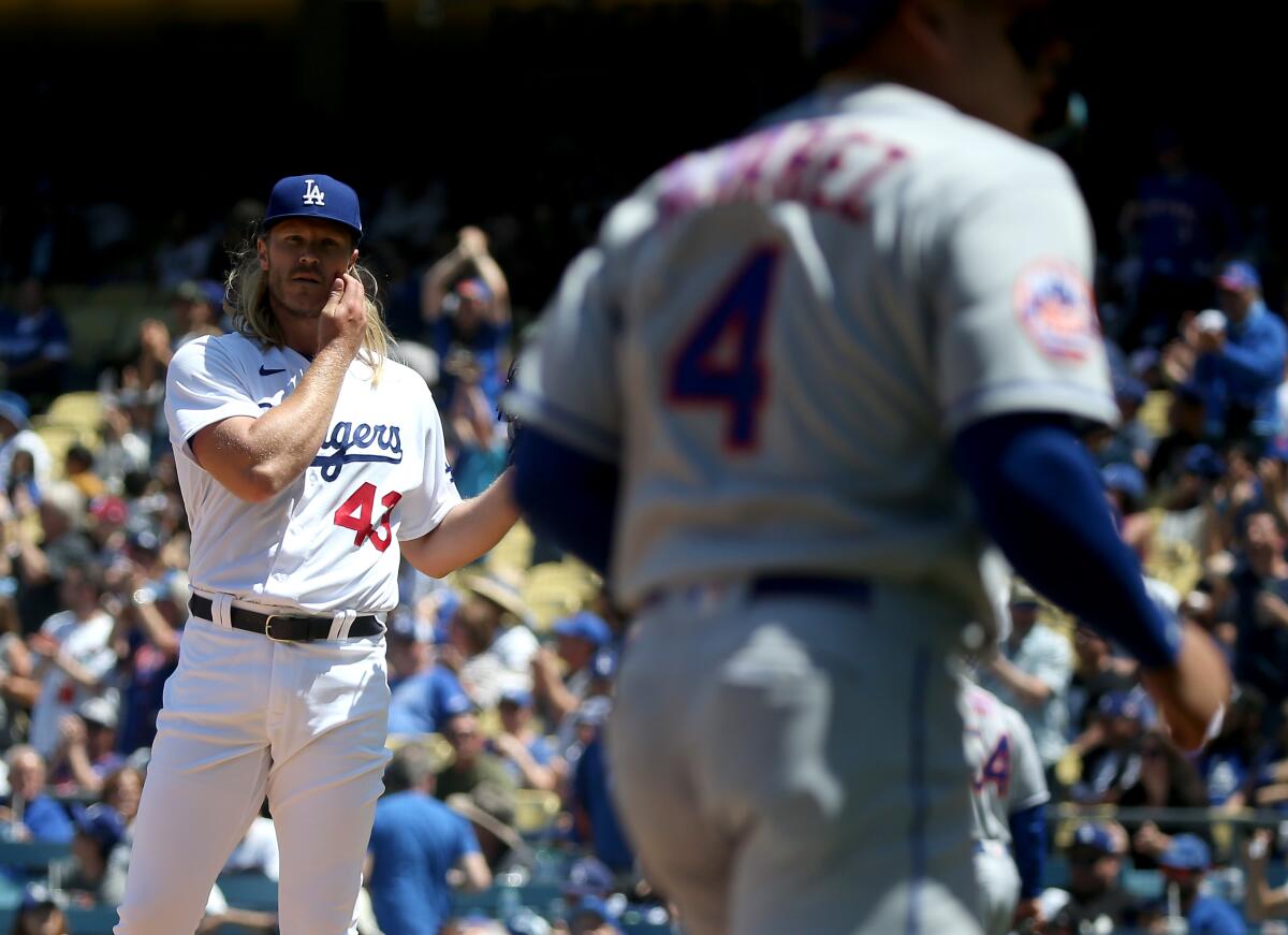 Dodgers starter Noah Syndergaard returns to the mound after giving up a two-run homer to the New York Mets.
