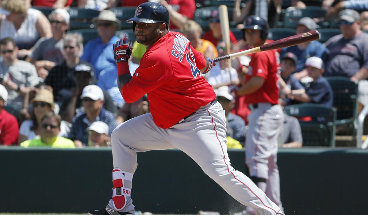 Boston Red Sox's Pablo Sandoval follows through on a ground out to third in the sixth inning of a spring training baseball game against the Minnesota Twins on March 31.