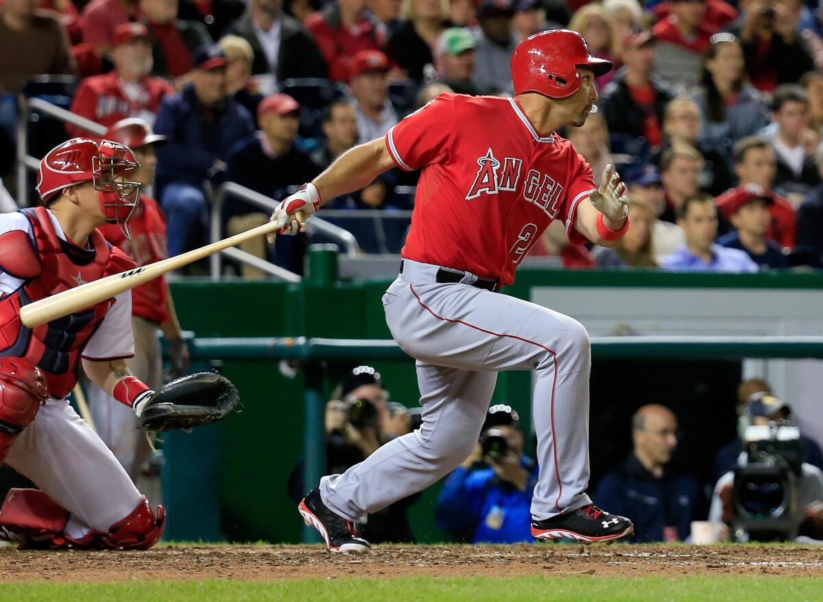 Angels pinch-hitter Raul Ibanez hits a three-run double in the eighth inning of the team's 4-2 win over the Washington Nationals on Monday.