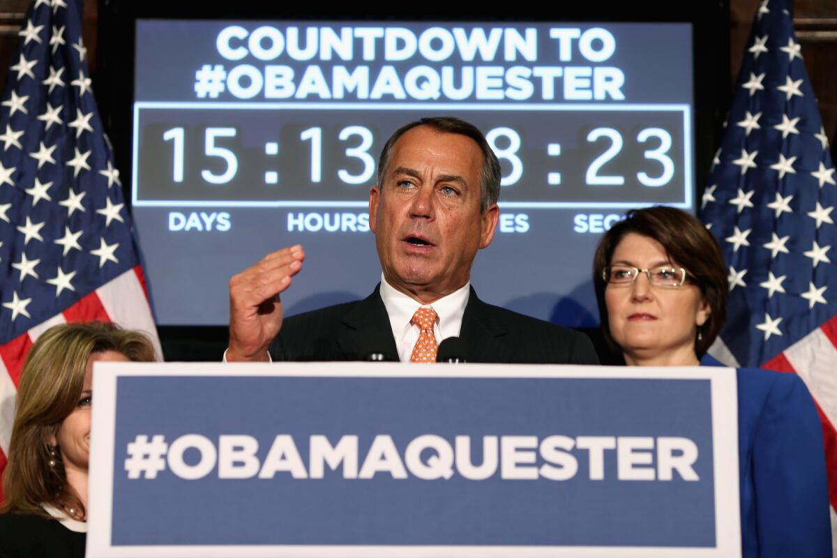 House Speaker John A. Boehner (R-Ohio), at the Republican Party headquarters on Capitol Hill, speaks in front of a countdown clock to March 1, when automatic spending cuts will take effect if an alternative is not found.