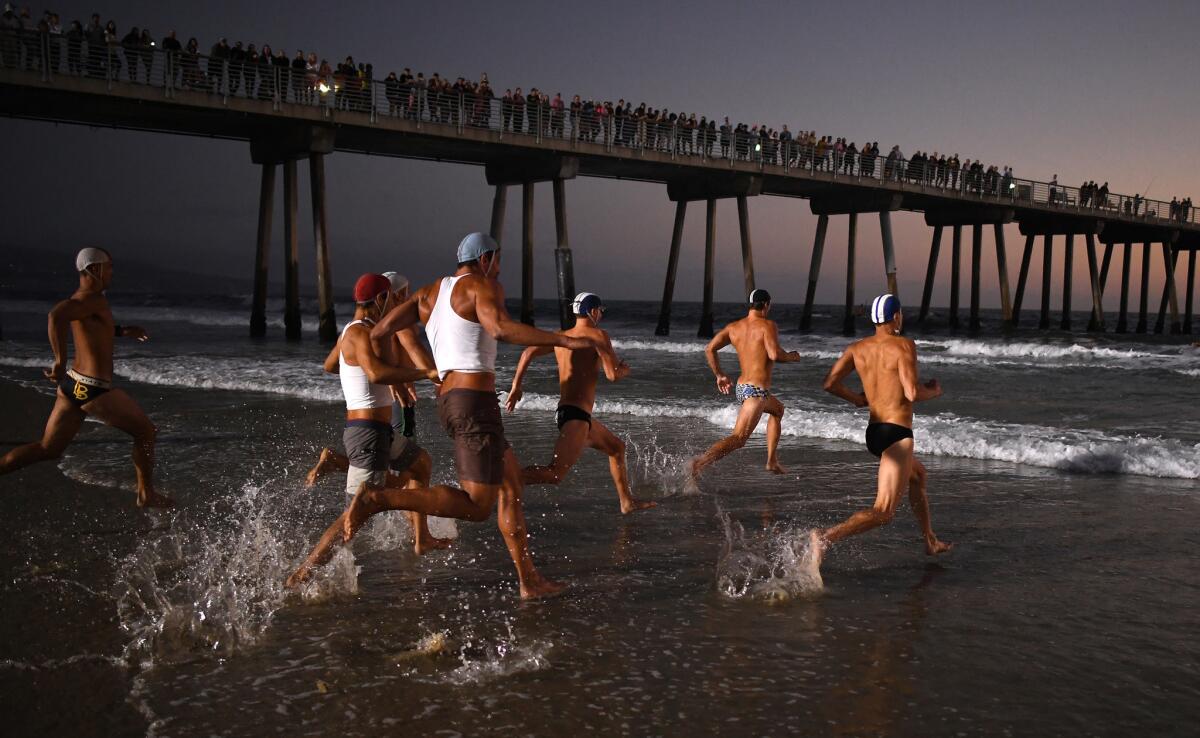 Spectators line Hermosa Beach Pier to watch the competition.