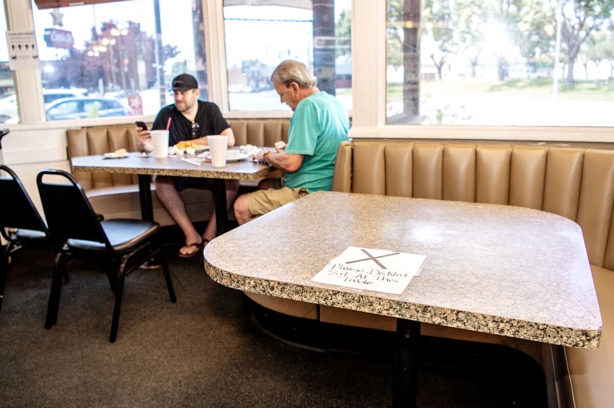 Inside Mossman's on May 21, the day Kern County lifted its ban on in-person dining.