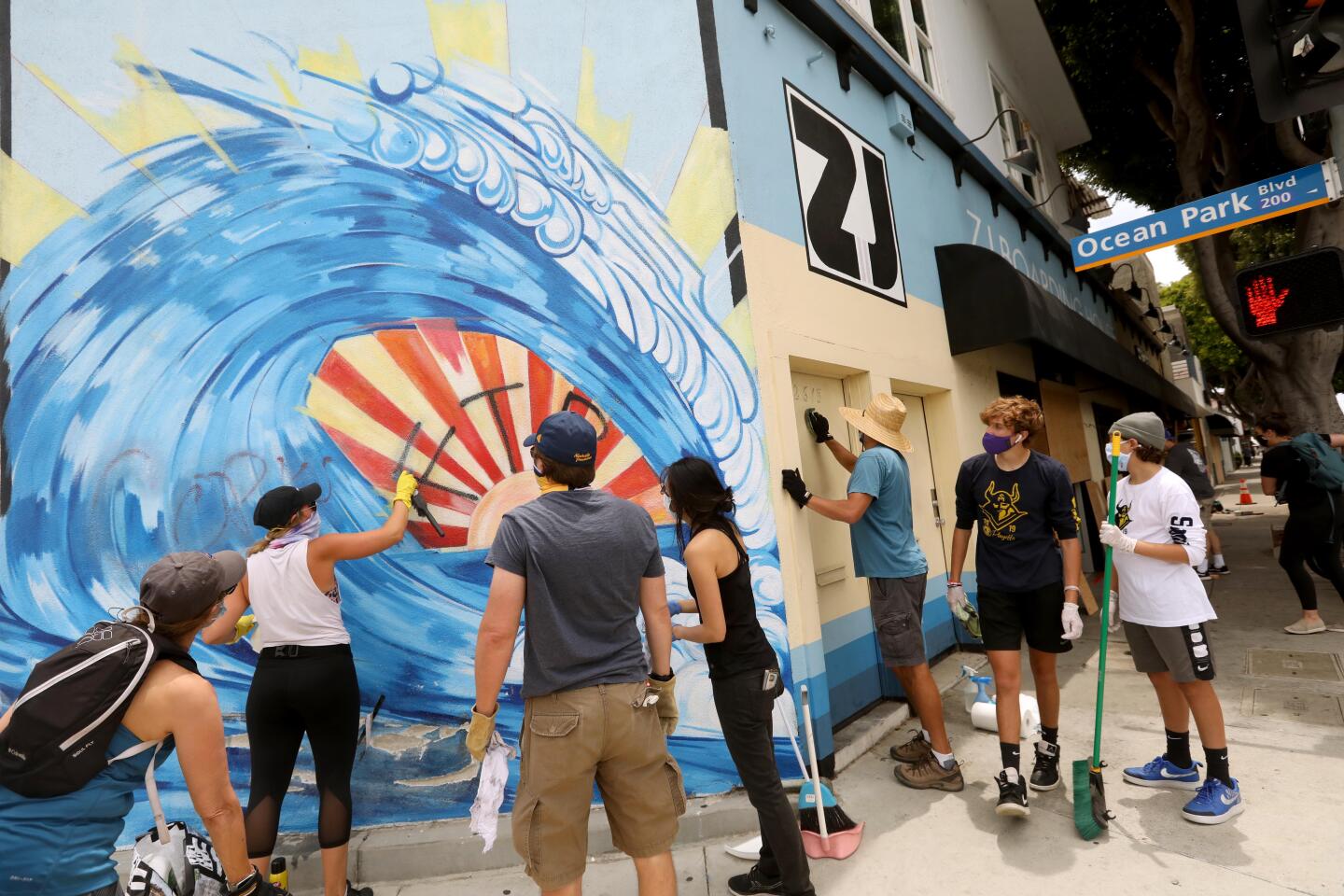 Volunteers help clean up graffiti in Santa Monica.