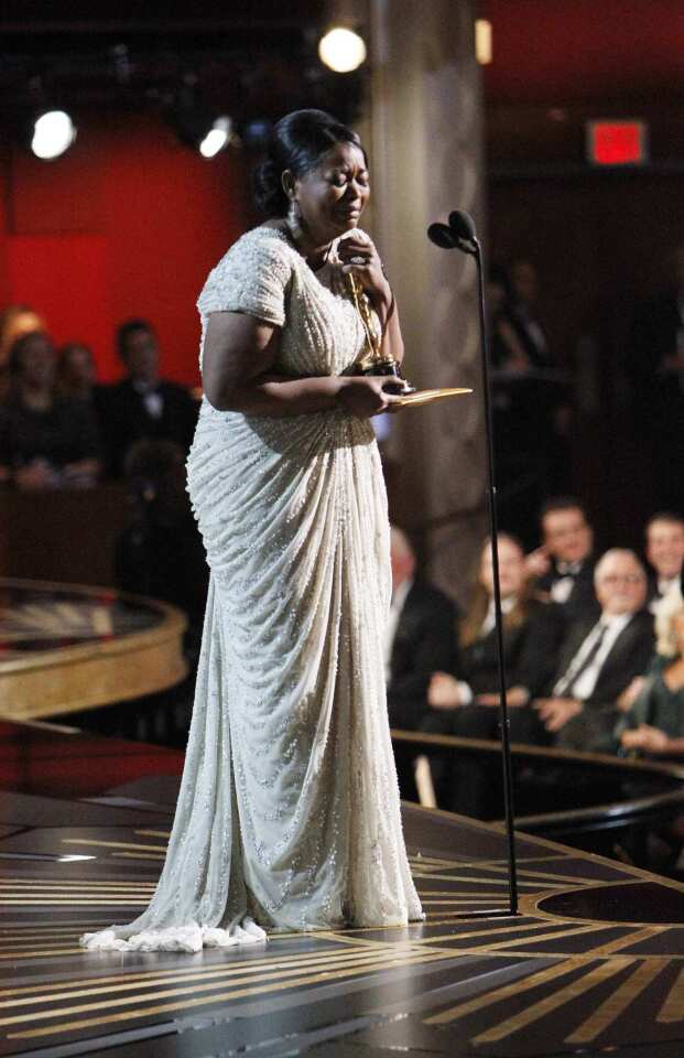 Octavia Spencer accepts her Academy Award for her supporting role in "The Help" at the 2012 Academy Awards in Hollywood.