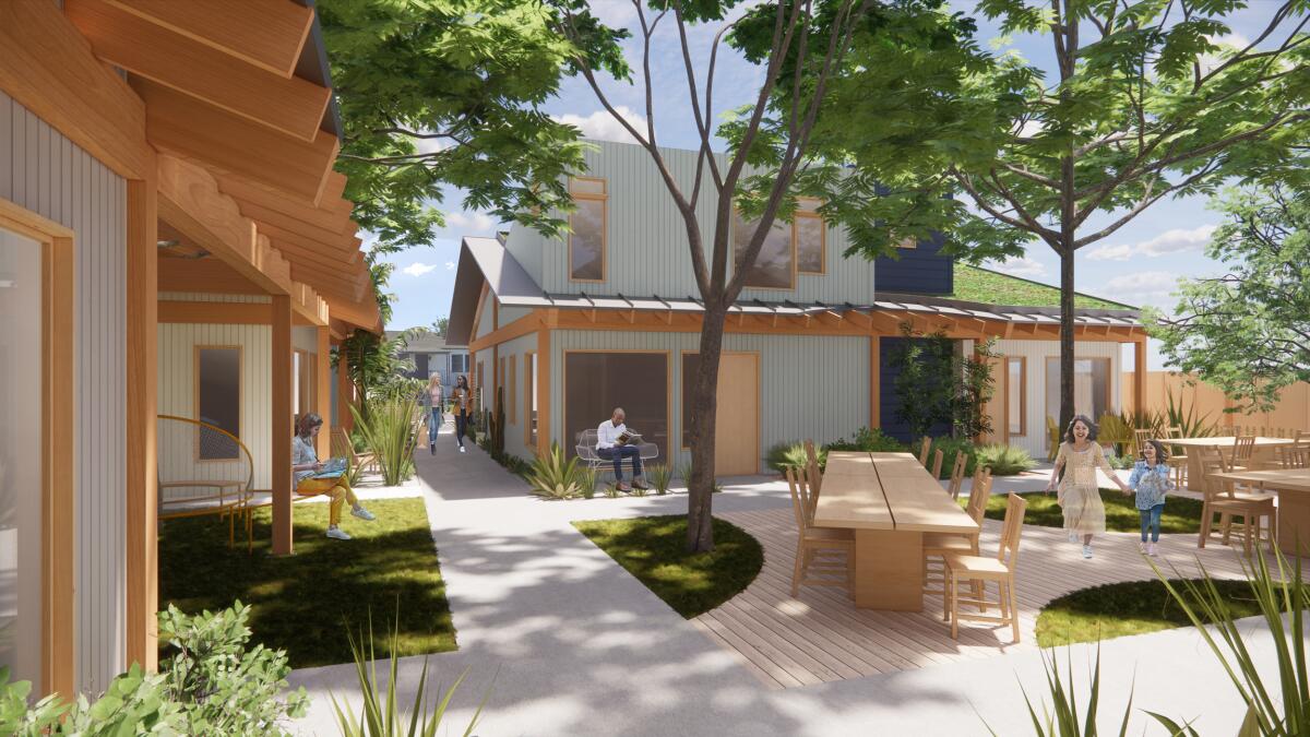 A rendering shows wood-trimmed bungalows surrounding a shared courtyard picnic area covered in trees
