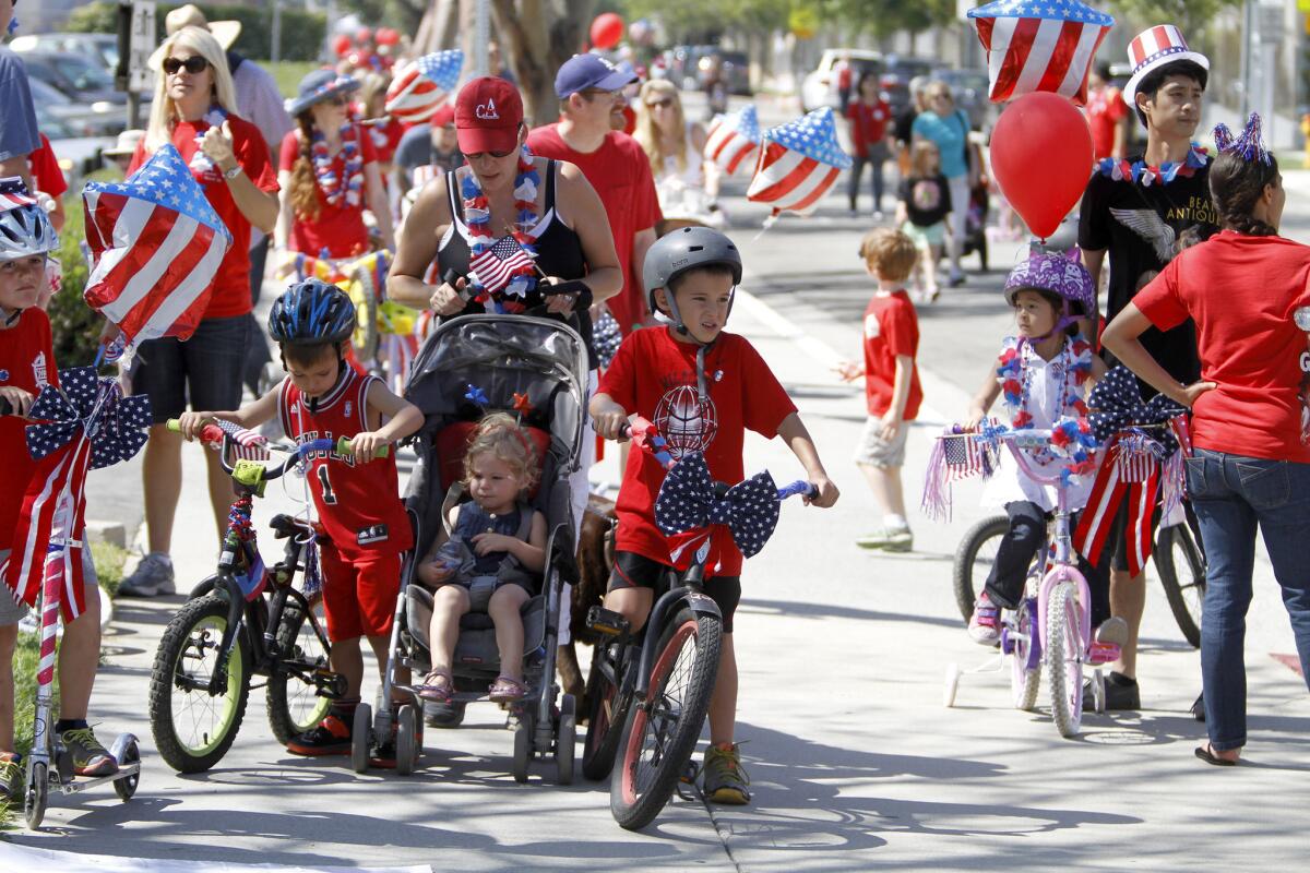 Children and their decorated bikes and scooters lined up for the annual Memorial Day Parade in La Canada Flintridge on Monday, May 26, 2014.