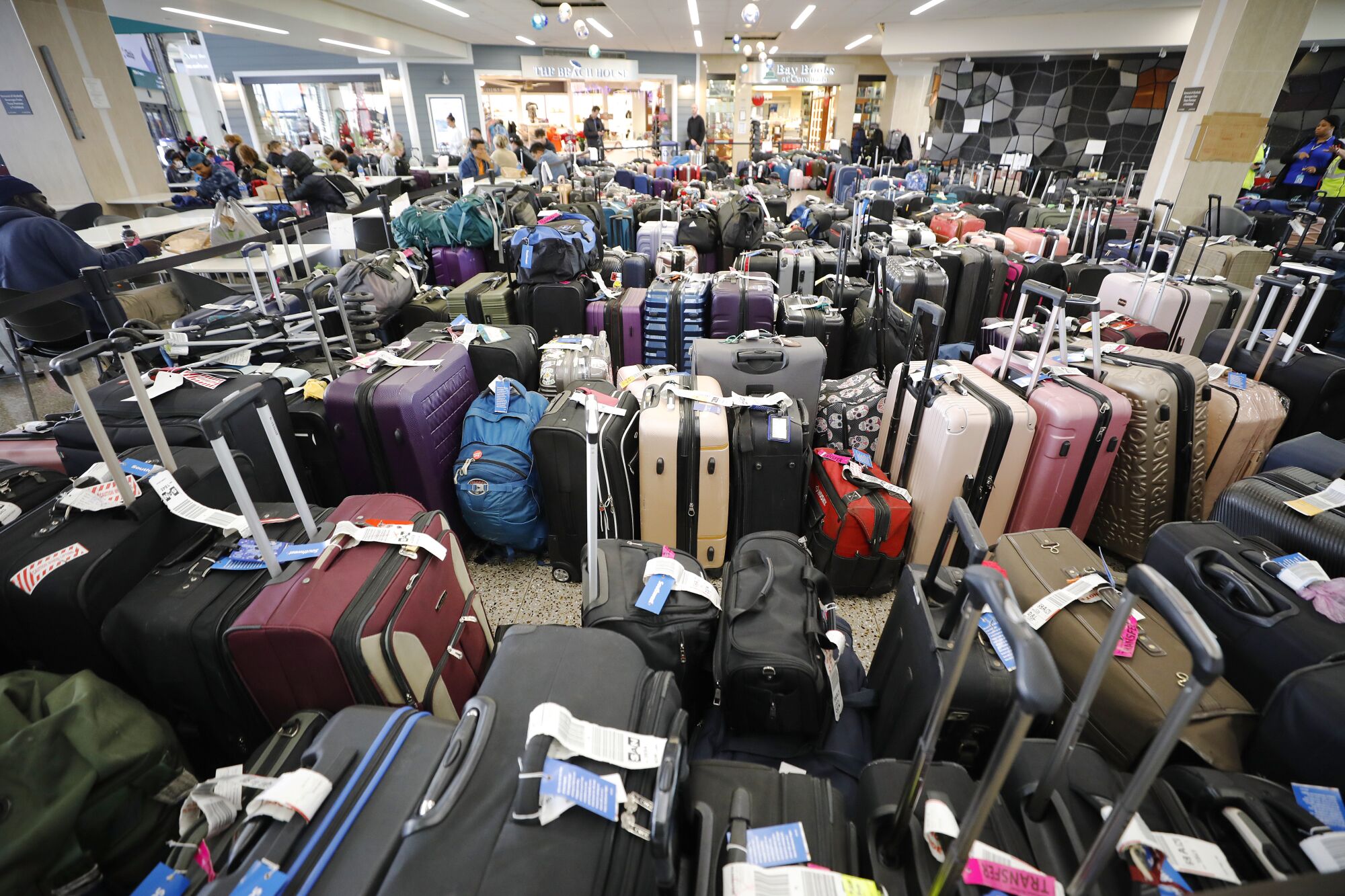 A sea of baggage waits to be reunited with its owners at San Diego International Airport on Tuesday.