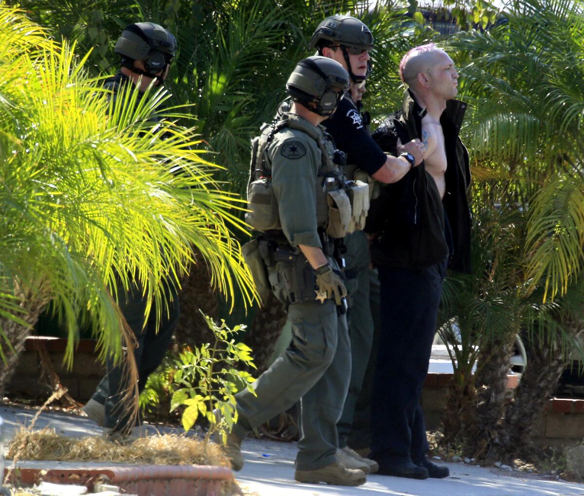 In October 2014, Jason "Mayhem" Miller was taken into custody after an hours-long standoff with police in Mission Viejo.