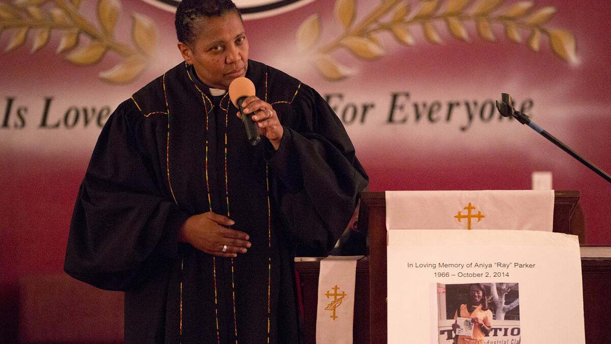 Rev. Pat speaks during Aniya Parker's memorial at Unity Fellowship of Christ Church in October. 2014 JENNA SCHOENEFELD, No usage without permission. www.JennaSchoenefeld.com