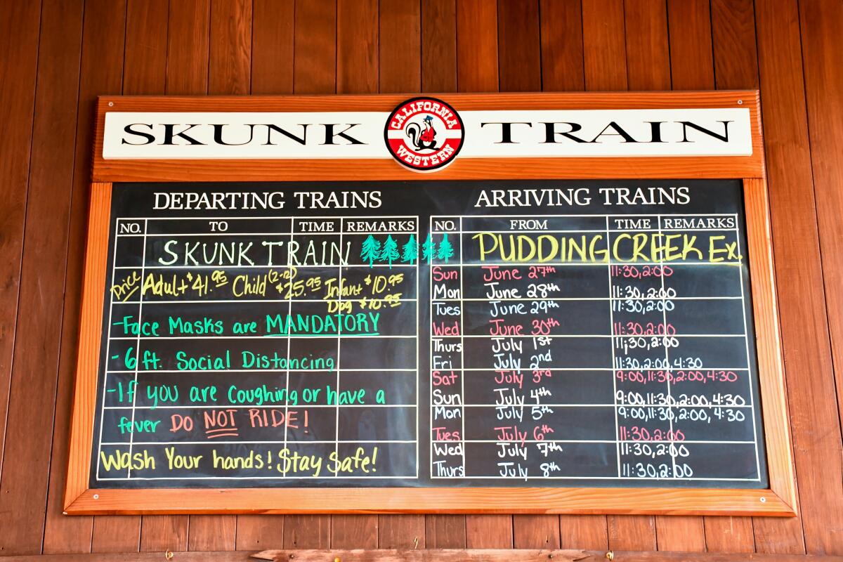 A board with the Skunk Train rules and schedule