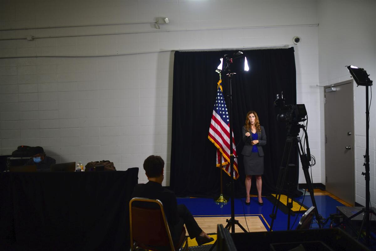 A sign language interpreter communicates the speech of  Democratic presidential nominee former Vice President Joe Biden