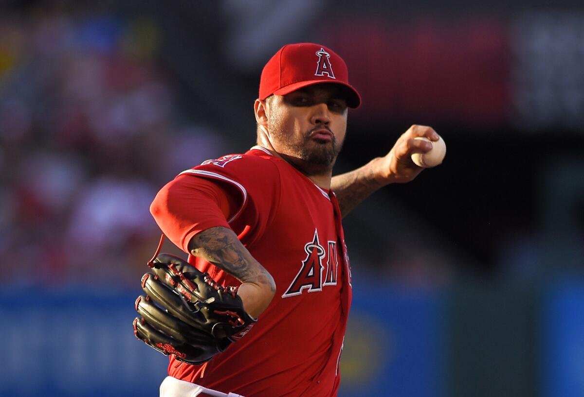 Angels starting pitcher Hector Santiago throws to the plate during the first inning of a game against the Minnesota Twins on June 15.