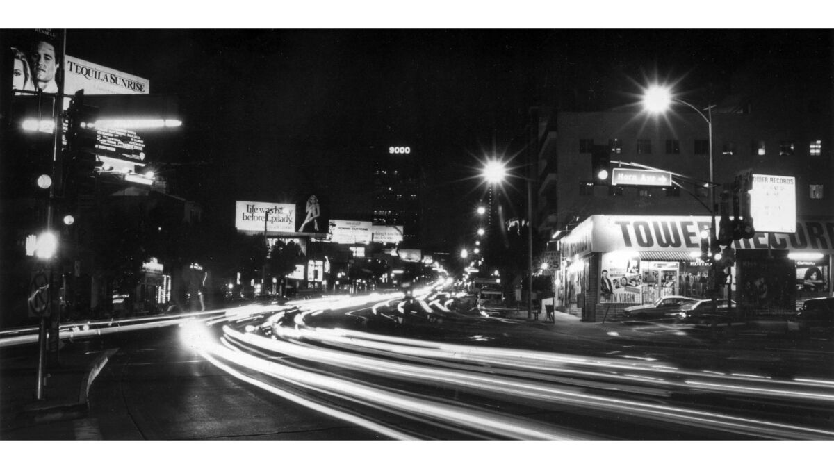Dec. 13, 1988: The bright lights beckon visitors to the famous Sunset Strip after dark.