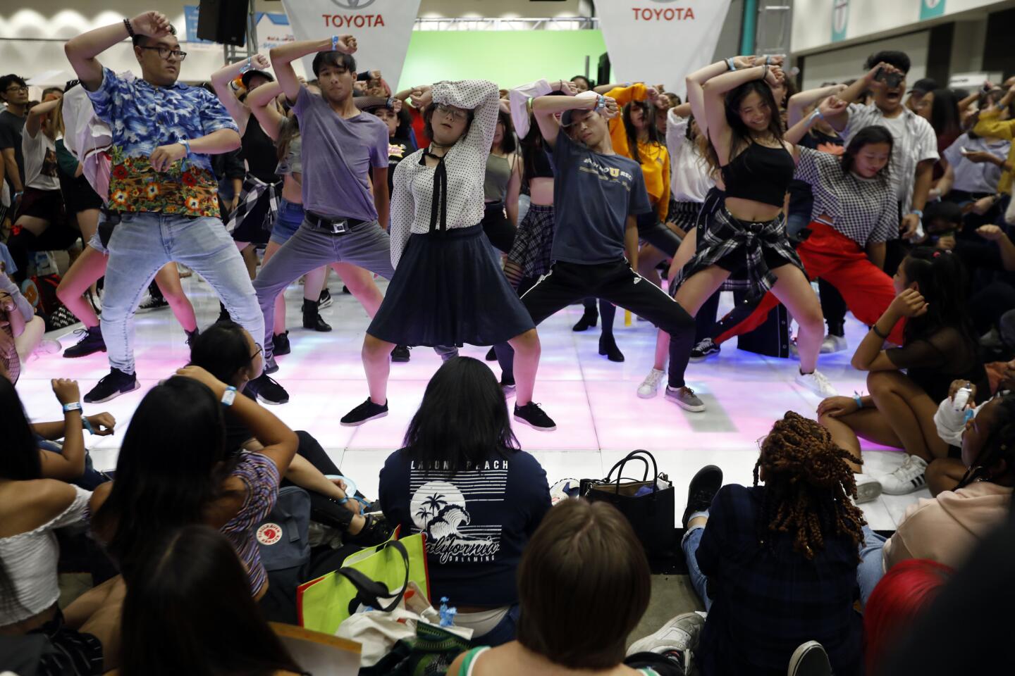 People break into dance at the Toyota Booth during KCON LA.