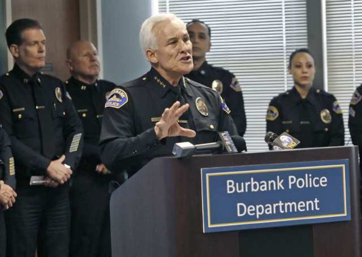 Burbank Police Chief Scott LaChasse talks the media at a holiday season press conference.