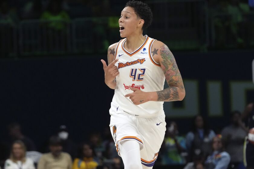 Phoenix Mercury center Brittney Griner (42) questions a call during the first half of a WNBA basketball basketball game against the Dallas Wings in Arlington, Texas, Friday, June 9, 2023. (AP Photo/LM Otero)