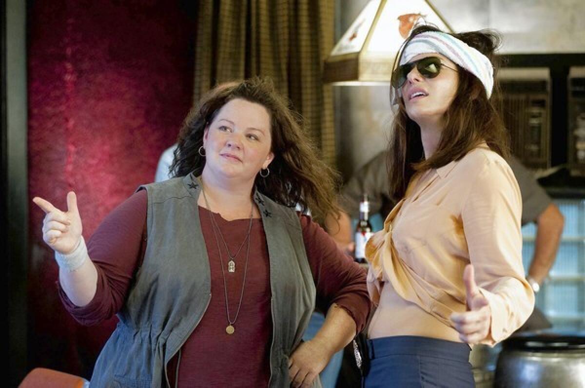 Melissa McCarthy, left, and Sandra Bullock in "The Heat."