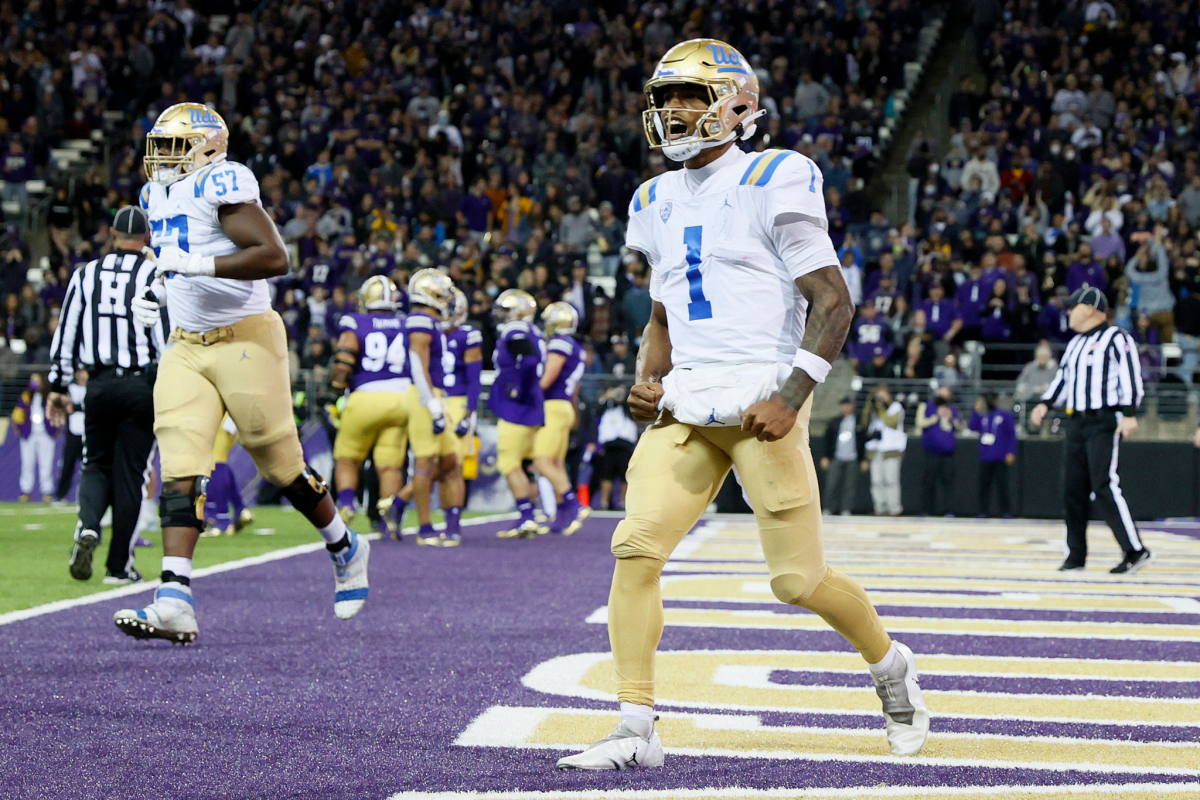 The Bruins' Dorian Thompson-Robinson (1) is fired up after a one-yard touchdown run in the second quarter.