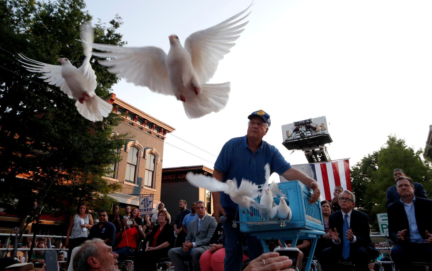 Doves are released during a vigil for victims of a shooting in the Oregon District of Dayton, Ohio.